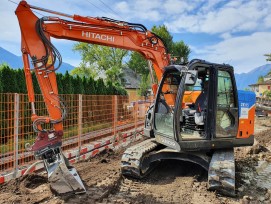 Pilotversuch SBB, Minusio, elektrisch betriebener Bagger Hitachi ZE85, Suncar